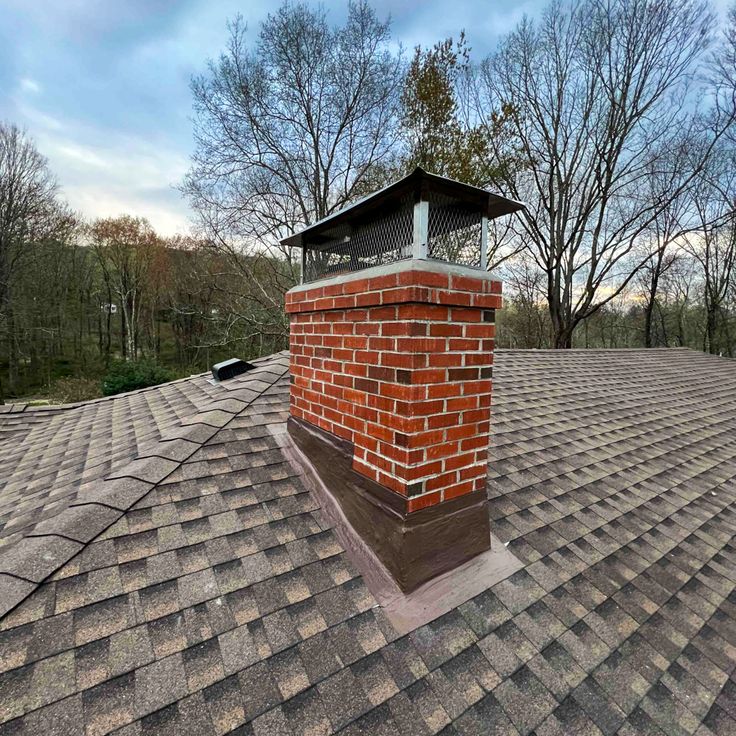Guilford Chimney Solutions Stylized House Logo
